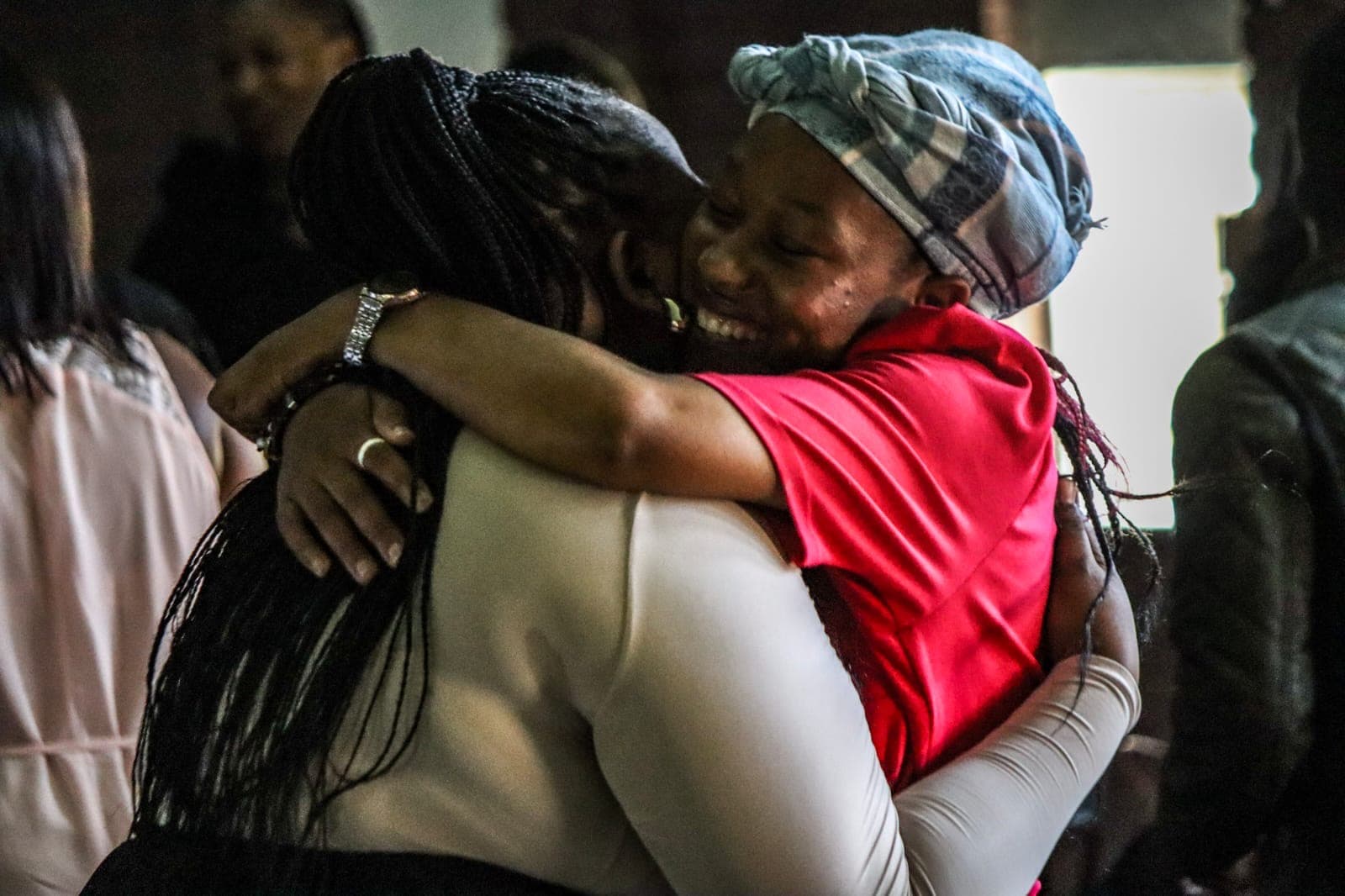 A welcoming moment for visitors at Renewed Life International.